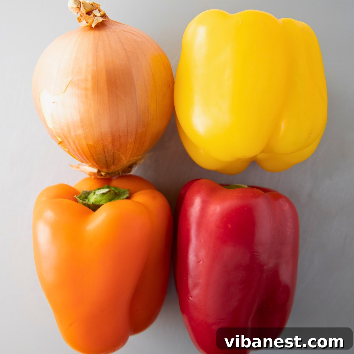 Sizzling Fajita Vegetables 3 overhead of bell peppers and an onion for fajita veggies