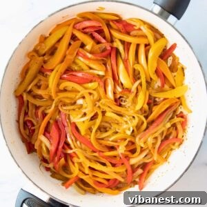 overhead of skillet of fajita veggies