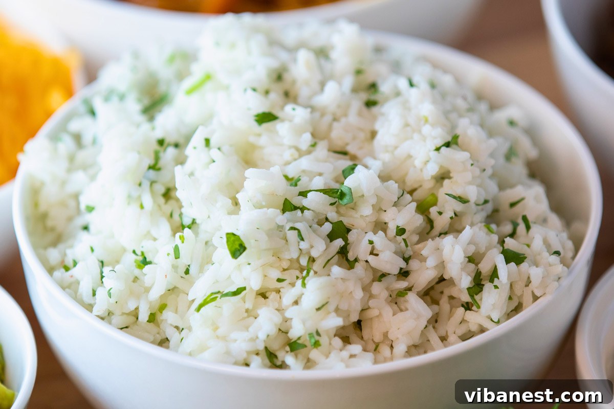 Zesty Instant Pot Cilantro Lime Rice 7 A close-up of a full bowl of Instant Pot Cilantro Lime Rice, highlighting its texture and fresh ingredients.
