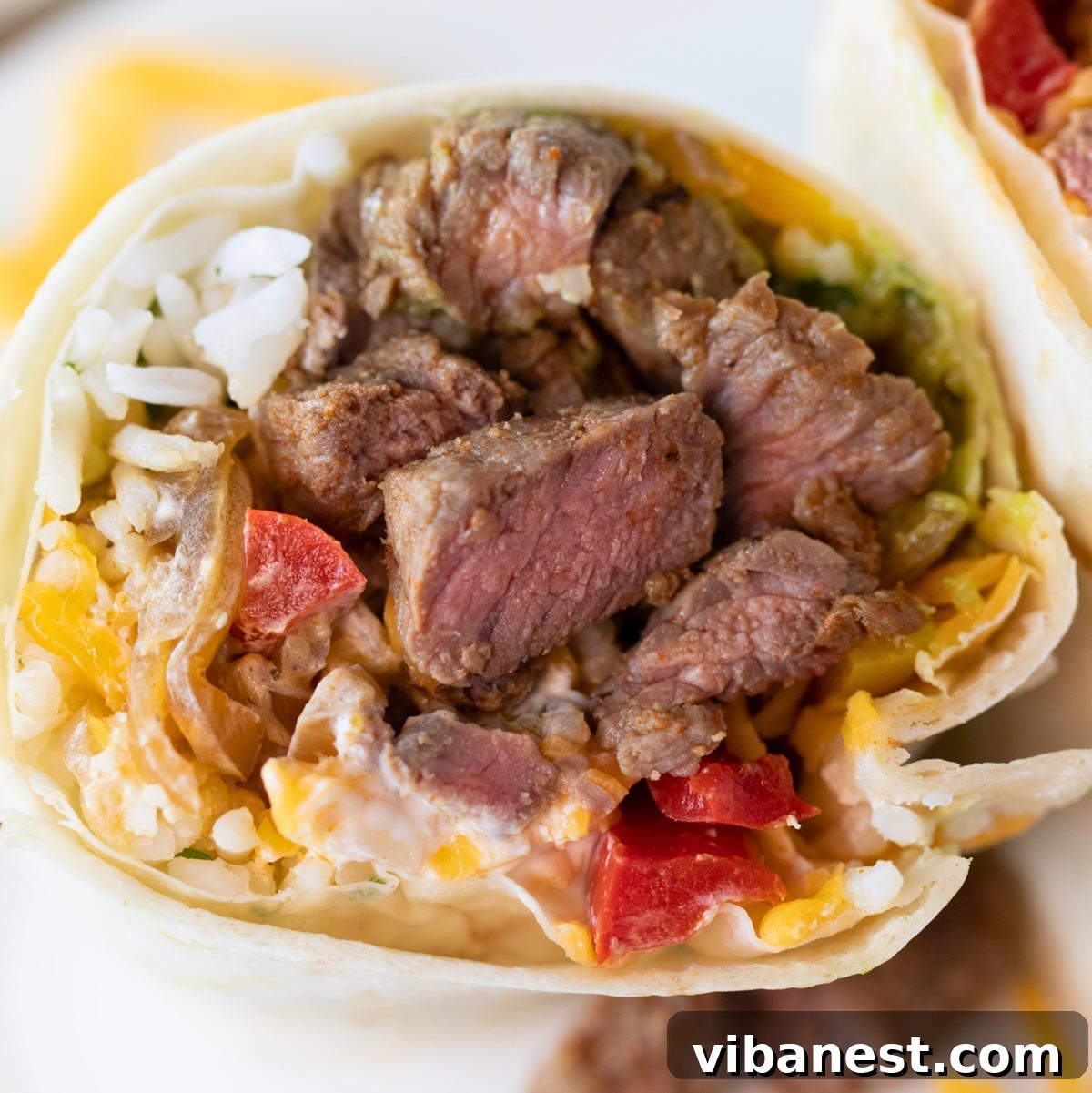 Simple Steak Burrito Delight 11 Close-up shot of a deliciously assembled easy steak burrito, showing off its generous fillings.