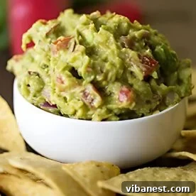 A vibrant bowl of the best homemade guacamole, ready to serve.