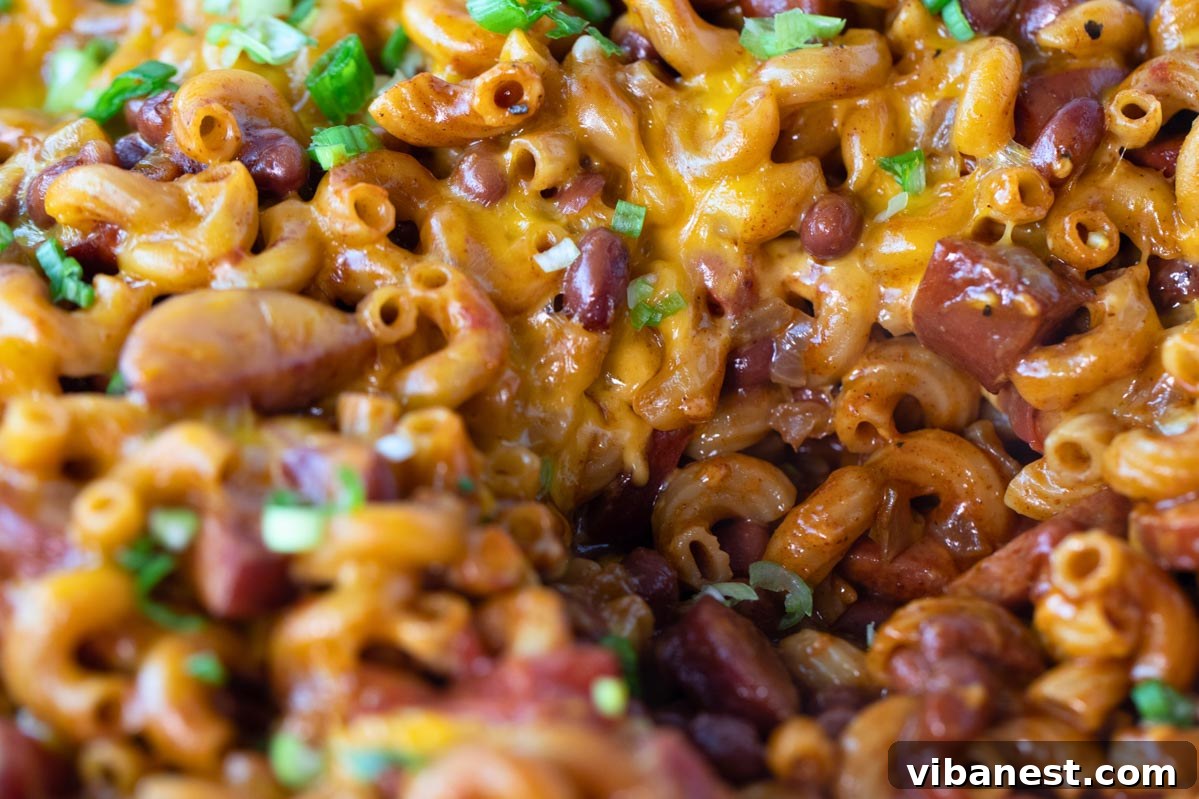 One Pot Wonder Chili Mac 3 A close-up view of the creamy, cheesy One-Pot Chili Mac, showcasing the rich texture of the sauce and tender macaroni.