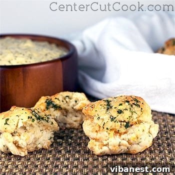 Cheddar Bay Biscuits Fresh from the Oven Freshly baked homemade Cheddar Bay Biscuits on a baking sheet