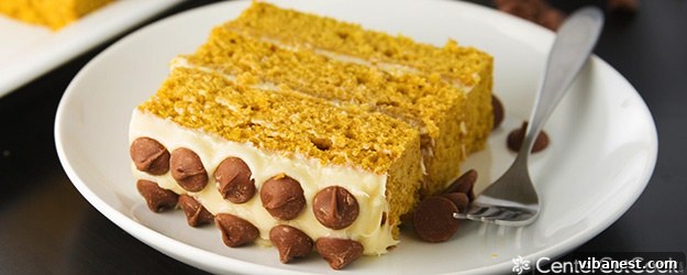 Decadent Pumpkin Layer Cake Delightful Pumpkin Layer Cake with Cream Cheese Frosting and Chocolate Chips