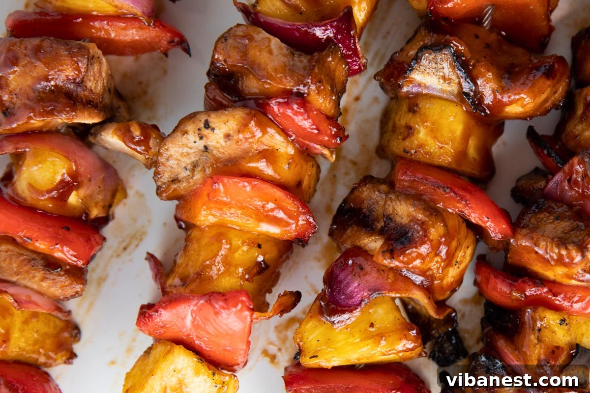 Char-Grilled BBQ Chicken Skewers 8 Perfectly grilled BBQ chicken kabobs basted with sauce, served hot off the grill