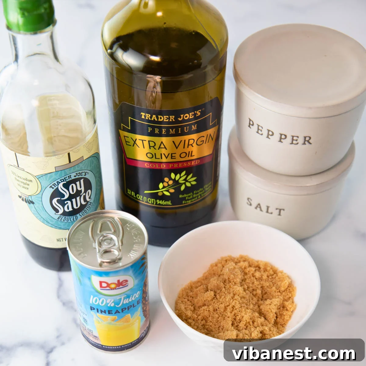 Char-Grilled BBQ Chicken Skewers 10 Marinade ingredients laid out, including soy sauce, pineapple juice, brown sugar, olive oil, salt, and pepper