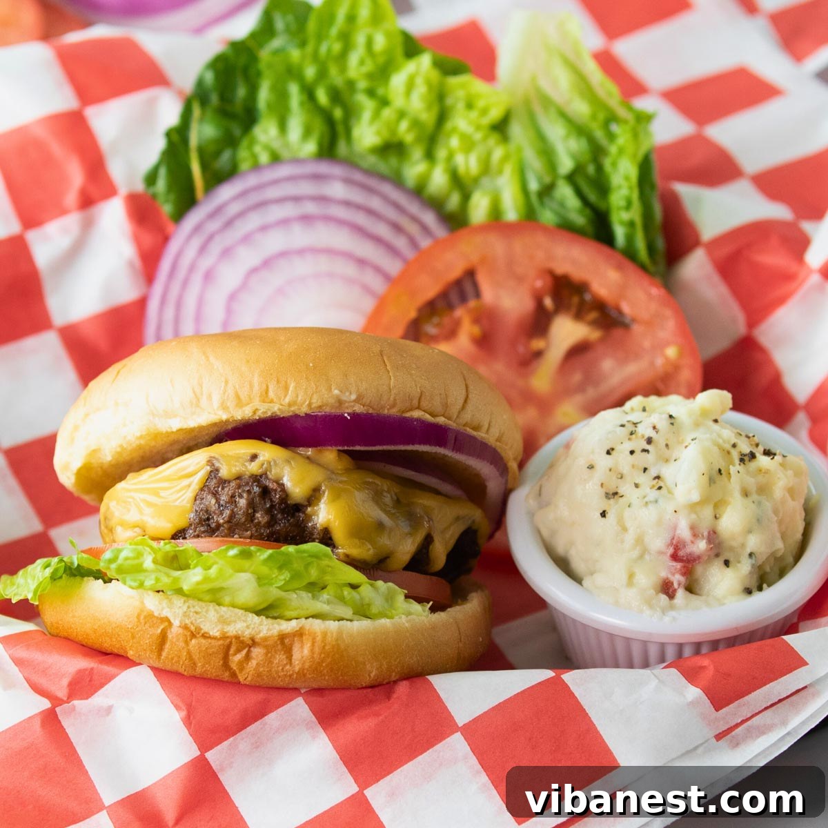 Air Fryer Cheeseburger Perfection 8 delicious air fryer cheeseburger served with fries and a drink