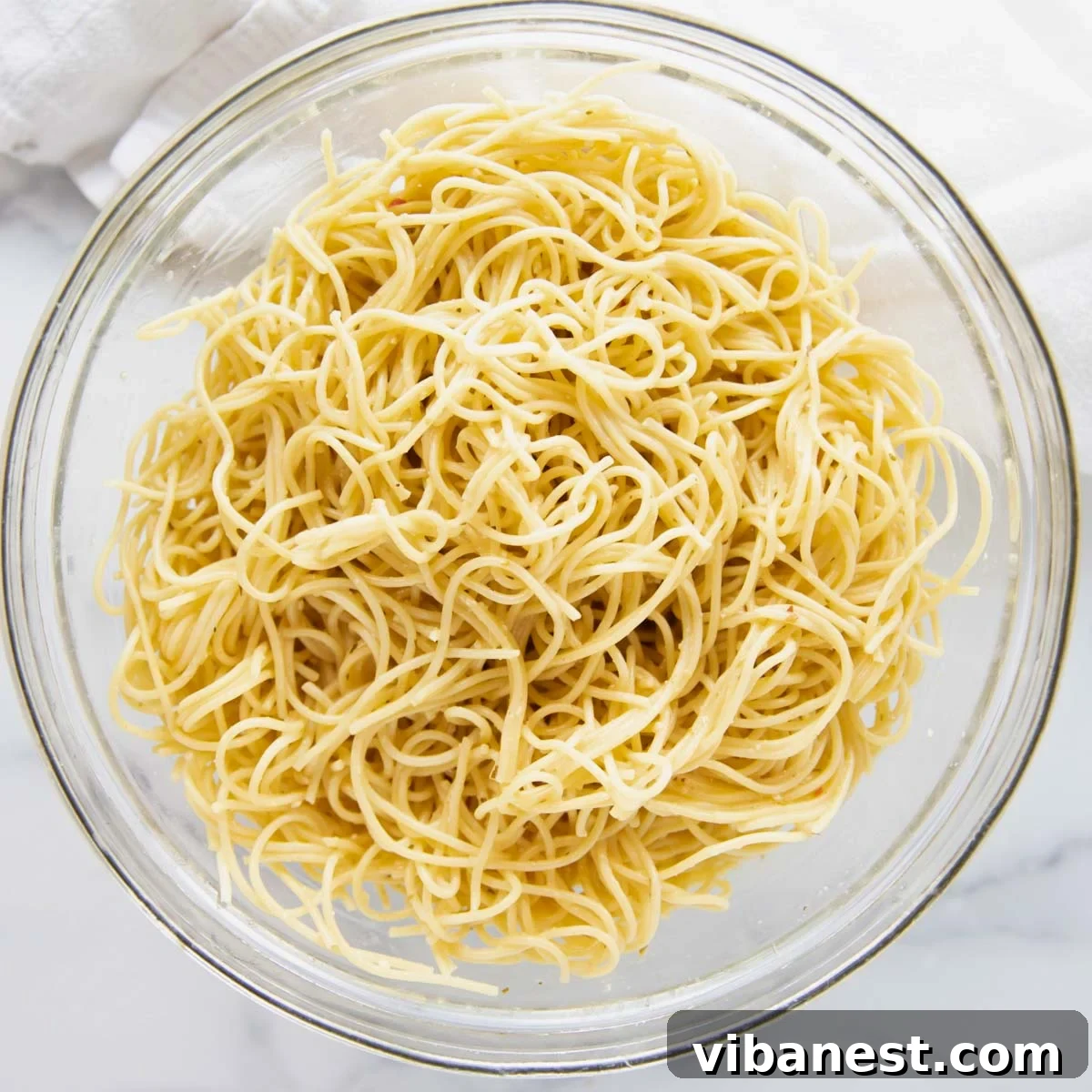 Effortless Zesty Spaghetti Salad 3 bowl of spaghetti noodles
