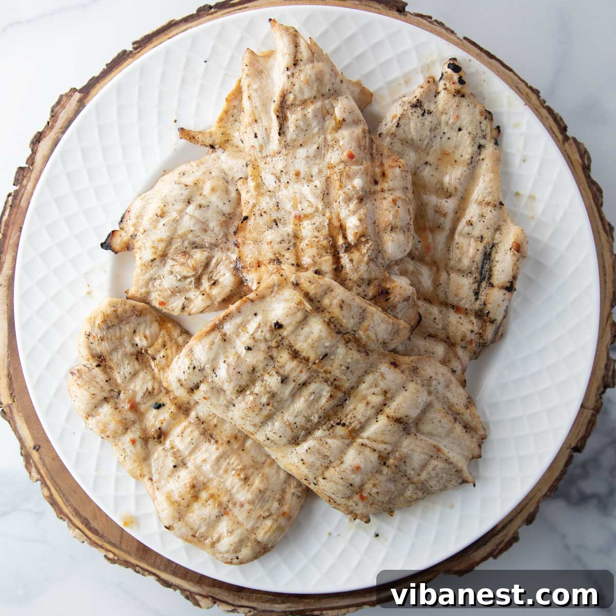 Effortlessly Delicious Thin Chicken Breasts 5 Close-up of juicy, grilled thin-cut chicken ready to be served