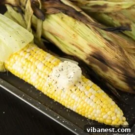 Grilled corn on the cob with a smoky flavor