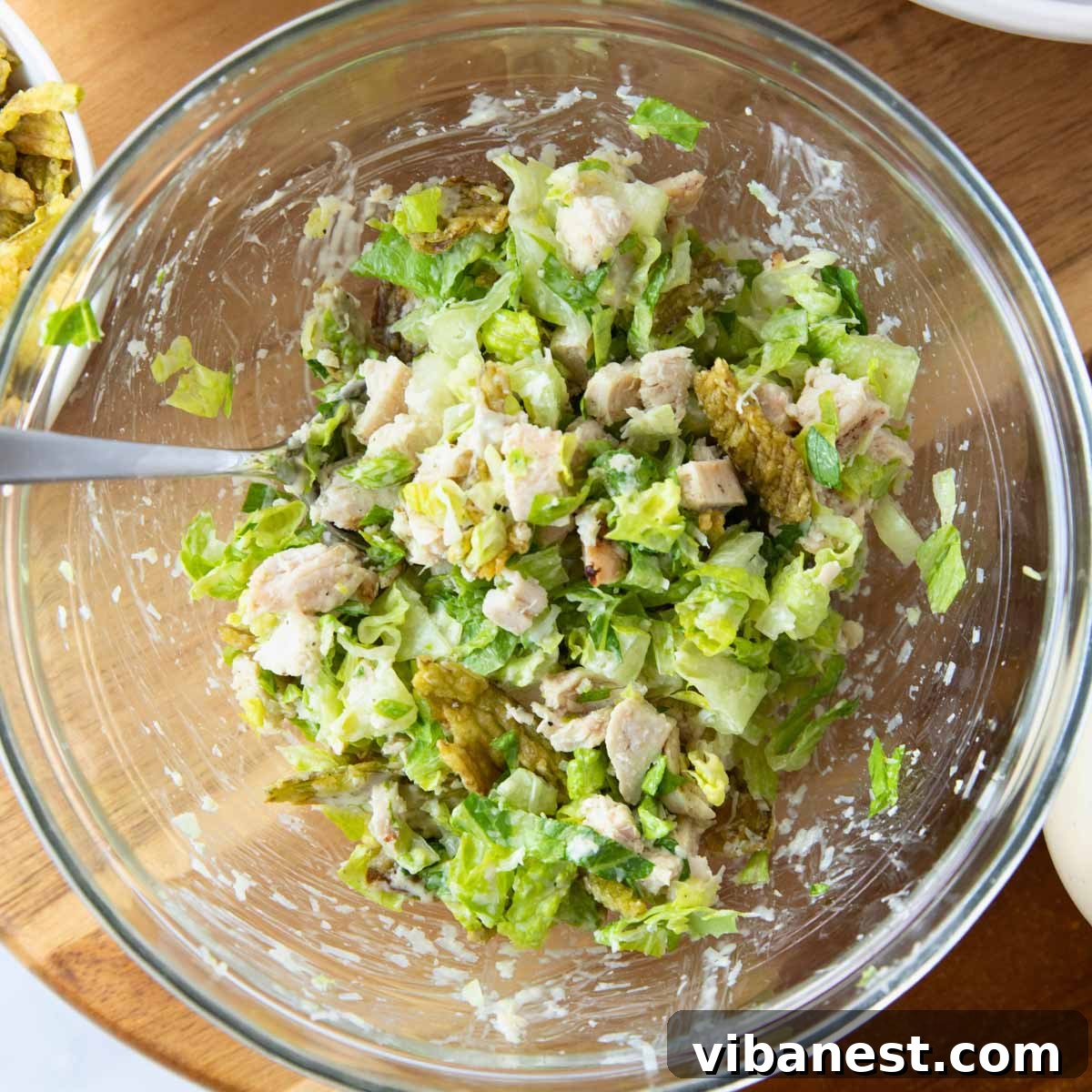 Next-Level Chicken Caesar Wraps 5 assembling a chicken caesar wrap - step-by-step process