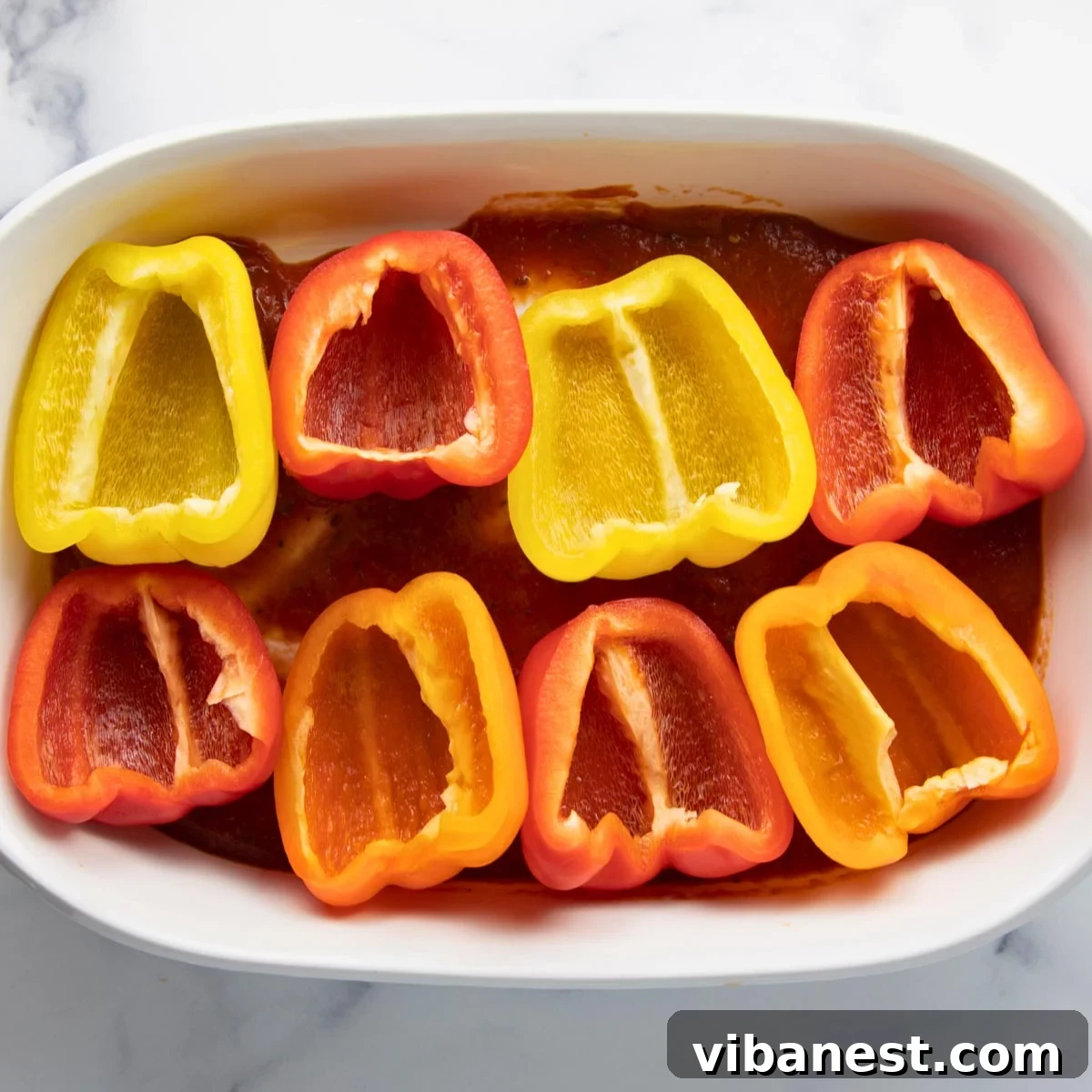 Hearty Chicken Stuffed Bell Peppers 5 Half-cut bell peppers, cleaned and ready for stuffing, demonstrating the ideal preparation for this recipe.