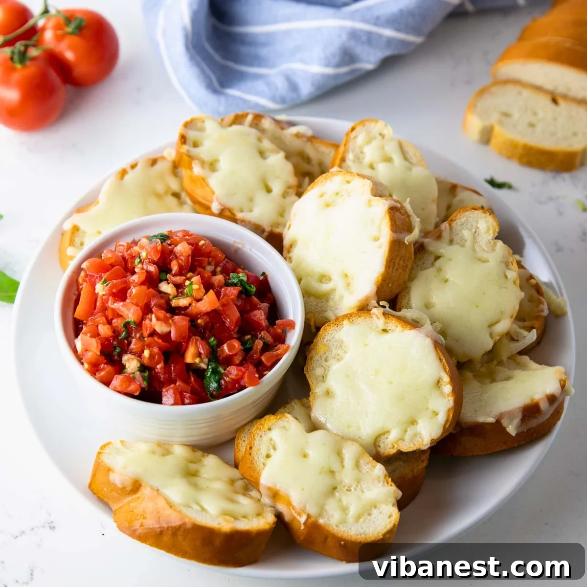 Melted Mozzarella Bruschetta 15 Assembled bruschetta on a plate