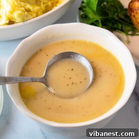 A boat of rich, smooth Perfect Turkey Gravy, ready for holiday feasts