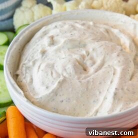 A bowl of creamy, fresh homemade ranch dip, perfect for snacking or entertaining