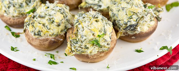 Delicious Spinach Artichoke Stuffed Mushrooms ready to serve