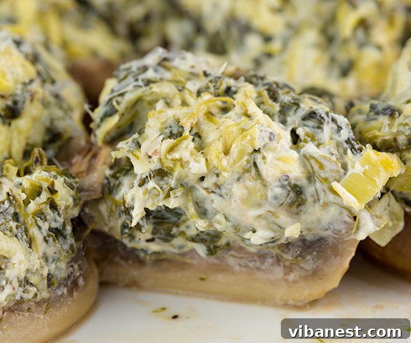 Spinach Artichoke Mushroom Poppers 5 Bowl of spinach artichoke filling mixture for mushrooms