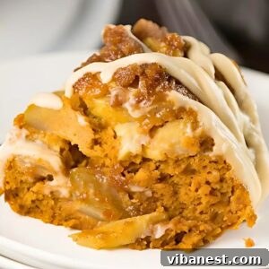 A top-down view of the glorious Pumpkin Apple Spice Bundt Cake with Cream Cheese Glaze, ready to be served.
