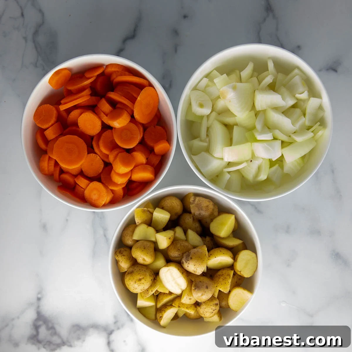 Instant Pot Irish Comfort Stew 7 Chopped potatoes, carrots, and onions prepared for the stew.