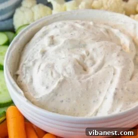 A bowl of the best homemade ranch dip, rich and creamy, ready for snacking.