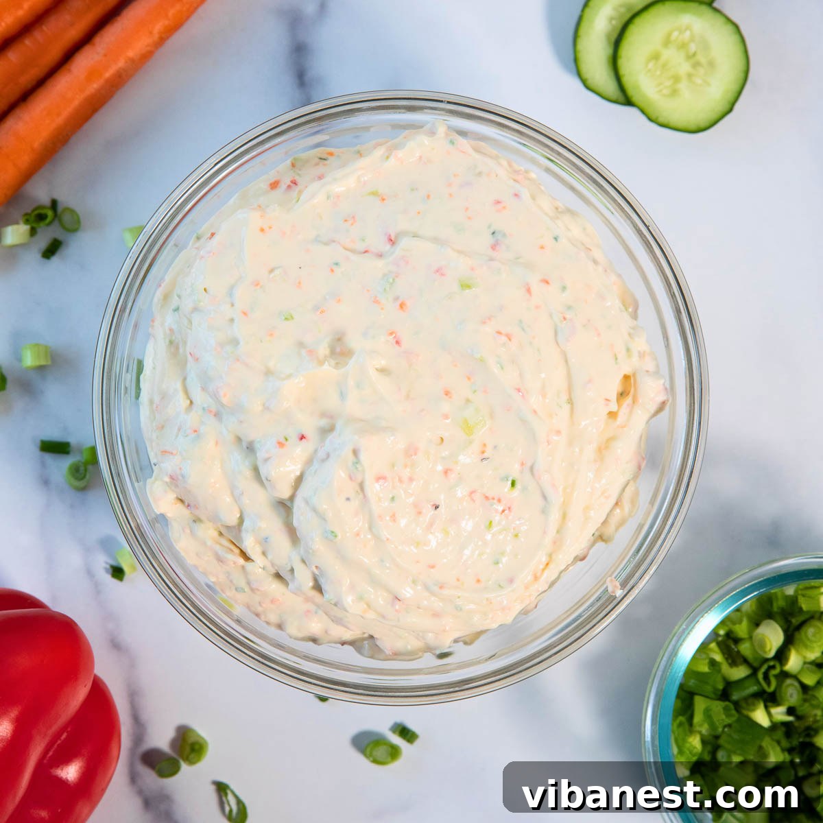 Garden Fresh Cream Cheese Veggie Spread 7 The finished veggie cream cheese spread in a bowl.