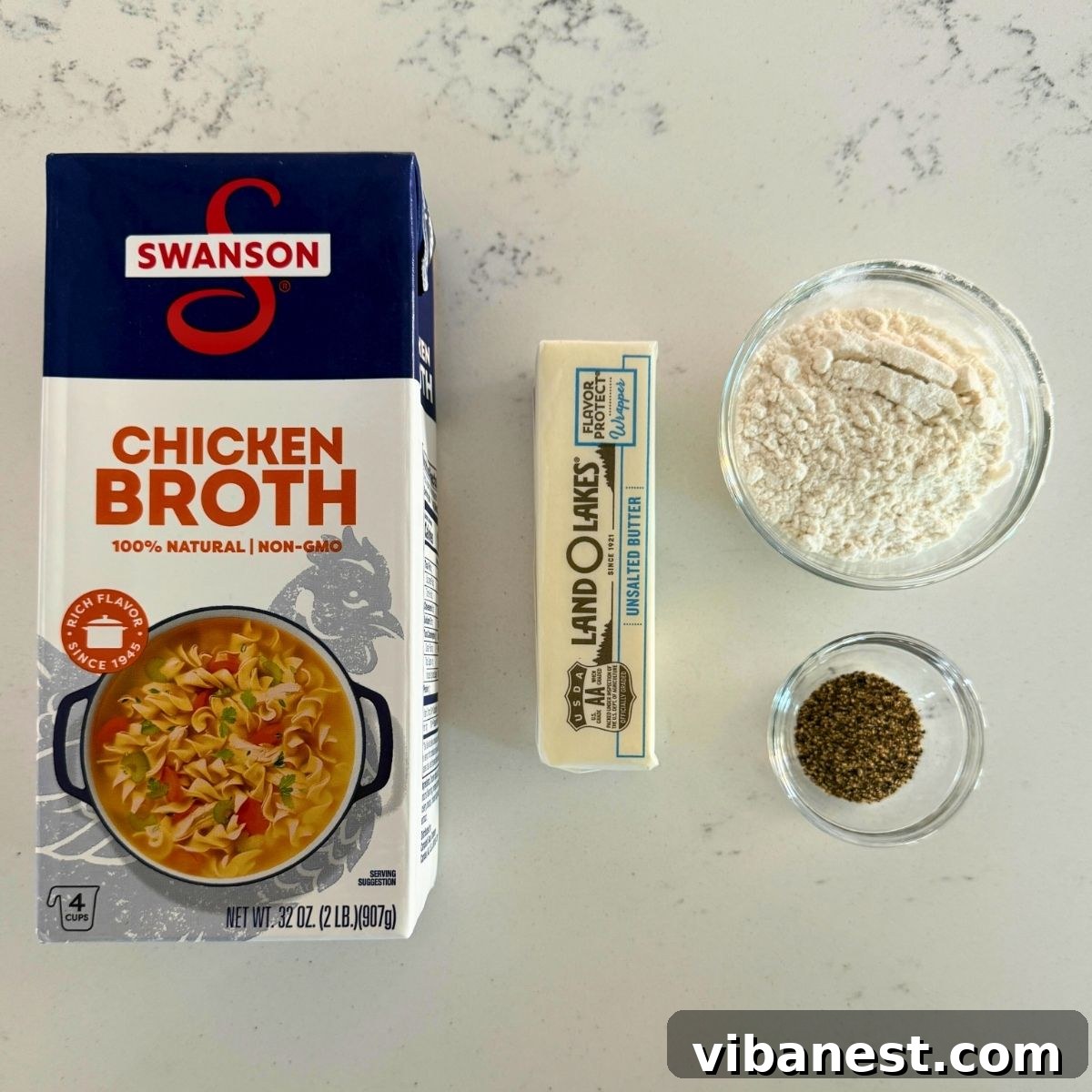 Effortless Chicken Gravy Drippings Optional 4 Measuring chicken drippings in a glass measuring cup