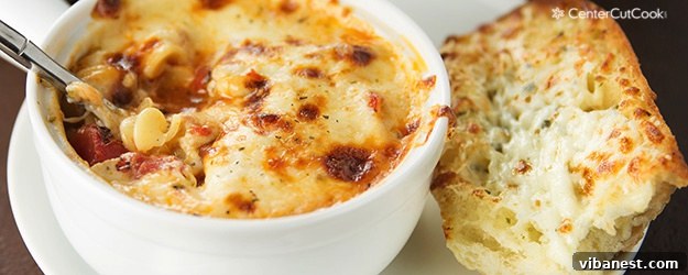 lasagna soup.jpg A top-down view of a large pot of simmering lasagna soup, showcasing the noodles, meat, and rich sauce.