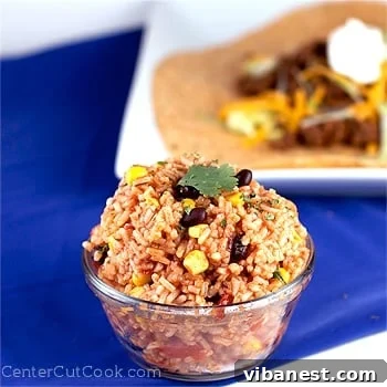 Perfectly Cooked Taco Rice Close-up of freshly cooked Taco Rice with visible black beans, corn, and finely chopped cilantro.