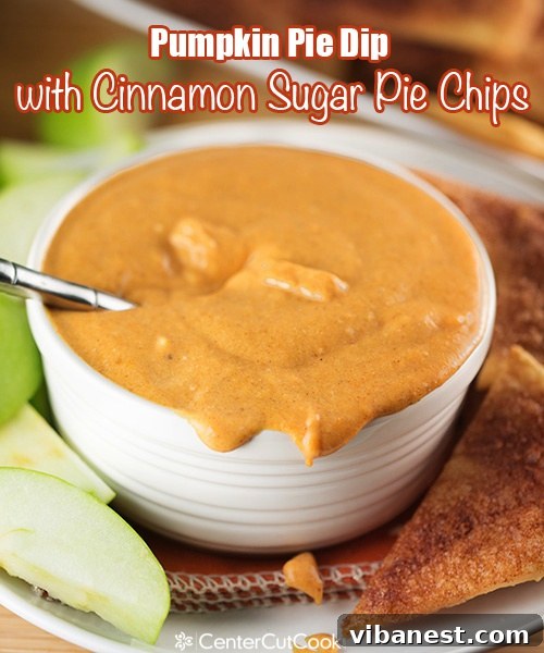 Creamy Pumpkin Pie Dip with Dippers Close-up of creamy Pumpkin Pie Dip in a bowl with apple slices