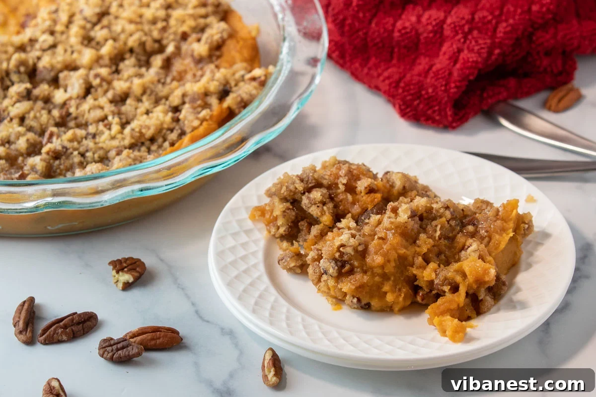 Ruth's Chris Style Sweet Potato Casserole 5 bowl of sweet potato casserole next to a plate of sweet potato casserole