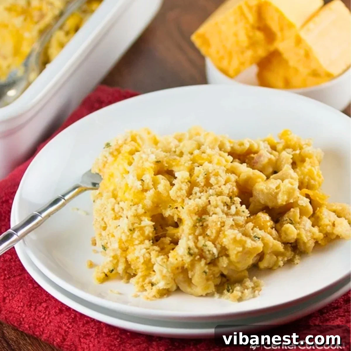 Golden Crusted Macaroni Bake 2 A golden, bubbly casserole dish of baked macaroni and cheese, topped with crispy breadcrumbs, promising ultimate comfort food.