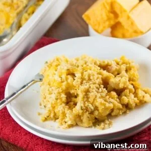 baked macaroni and cheese with evaporated milk and eggs topped with a bread crumb topping