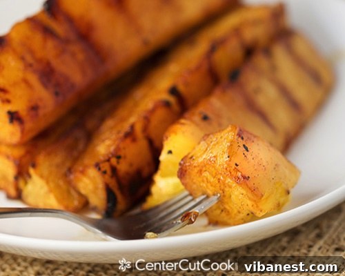 grilled pineapple 6.jpg Several grilled pineapple spears with melted brown sugar and cinnamon glaze