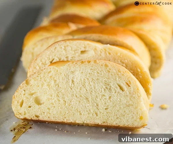 The finished, golden-brown Challah bread loaf
