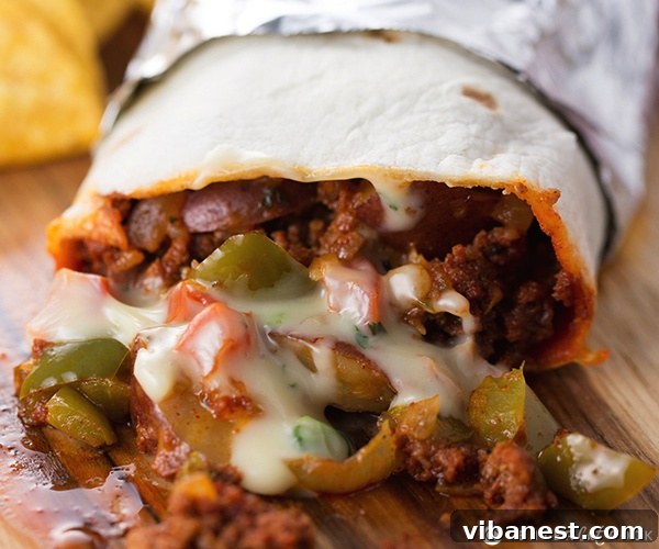 Chorizo Potato Queso Burritos Plated Delicious and spicy Chorizo, Potato, and Queso Burritos ready to be served, showcasing the rich filling and golden tortilla.