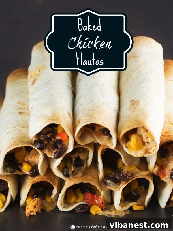 Close-up of freshly baked chicken flautas arranged on a white plate, showing their golden-brown crisp exterior and delicious filling.