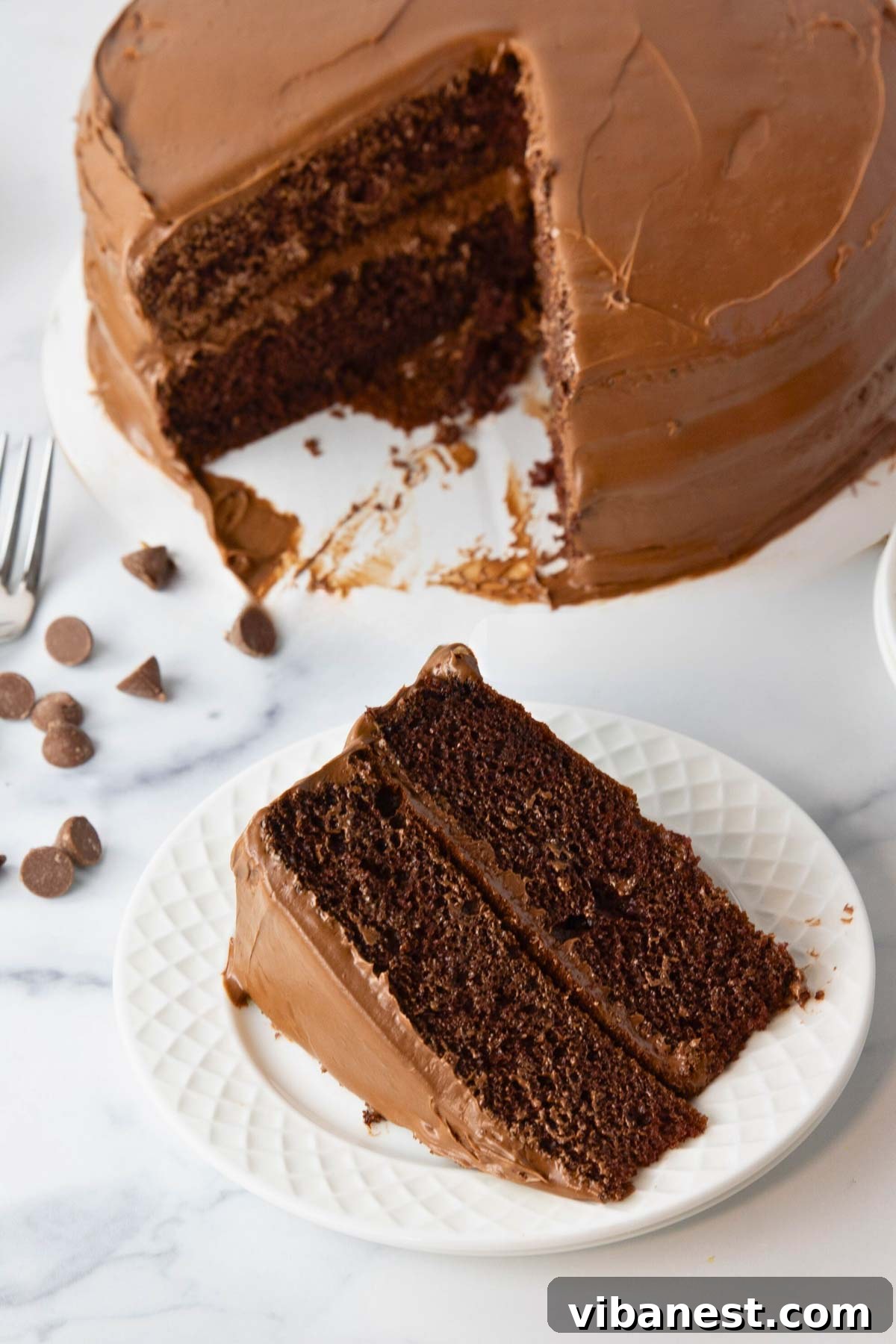 Savor Portillos Legendary Chocolate Cake 13 A beautifully frosted Portillo's copycat chocolate cake, ready to be served