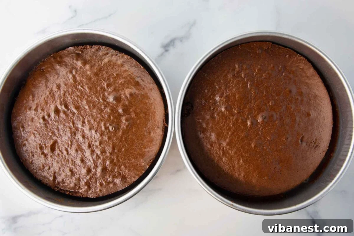 Savor Portillos Legendary Chocolate Cake 8 Baked chocolate cakes cooling on a wire rack
