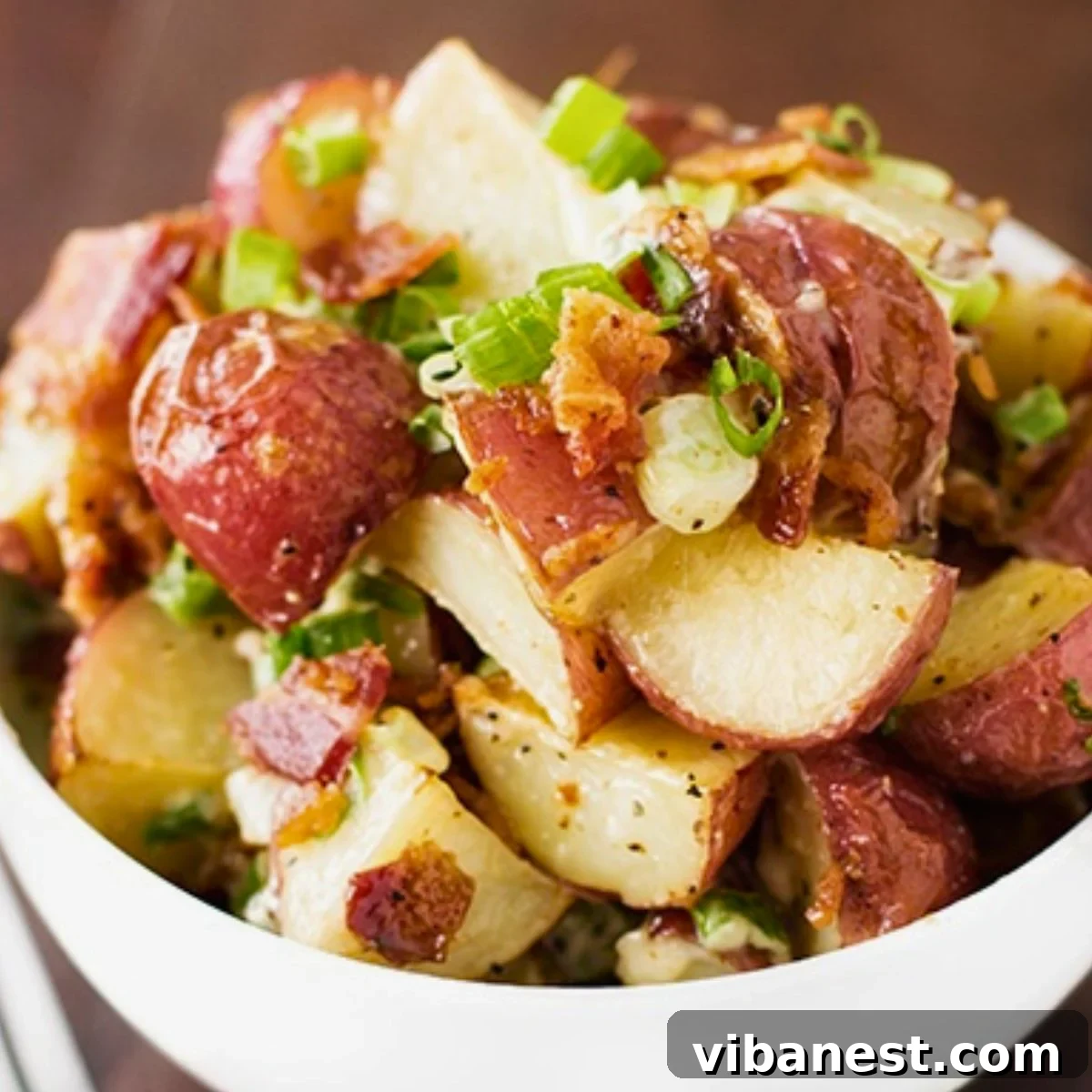 Golden Roasted Potato Salad 2 roasted warm potato salad - a delightful side dish with tender potatoes and crispy bacon