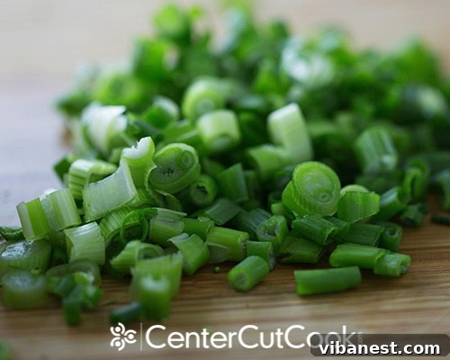 roasted potato salad 6.jpg Freshly chopped scallions, ready to brighten the salad