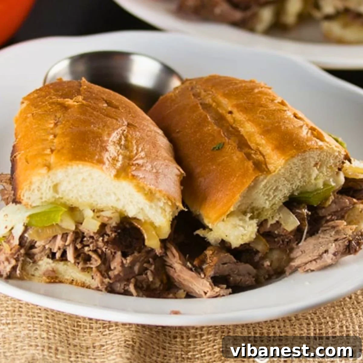 Tender Slow Cooker French Dip Sandwiches 2 slow cooker French dip sandwiches with au jus