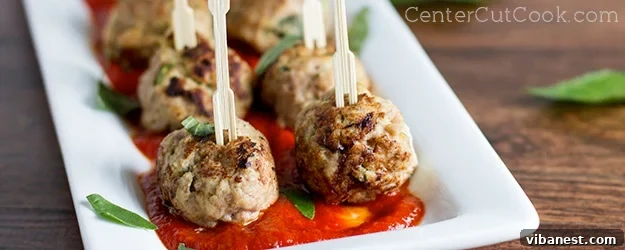 turkey meatballs.jpg Close-up of a single turkey meatball, showcasing its tender texture.