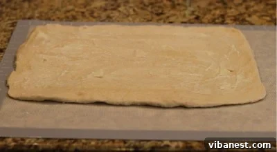 Deep Dish Pizza Dough Buttered Dough rolled and buttered for deep dish pizza