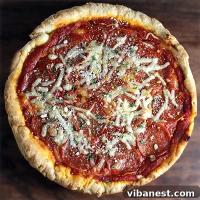 Baked Deep Dish Pizza Freshly baked Chicago Deep Dish Pizza