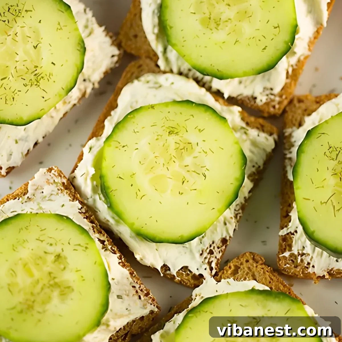 Cucumber Sandwiches for Parties A beautiful platter of elegant cucumber sandwiches, ready for a shower or tea party