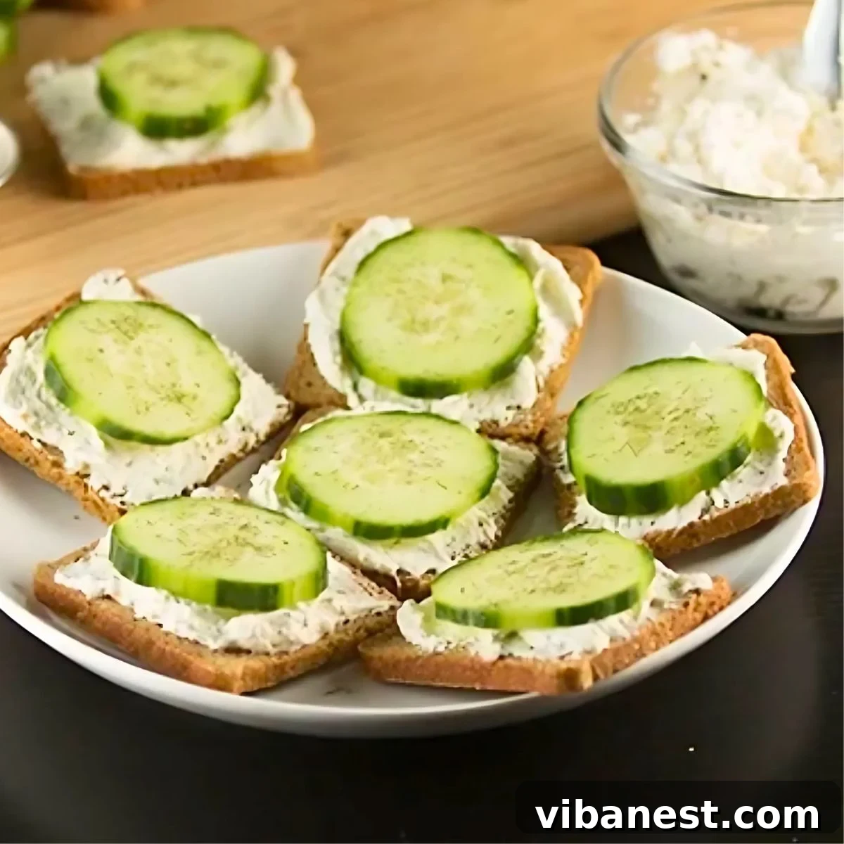 Crisp & Cool Cucumber Sandwiches 3 A plate of freshly prepared cucumber sandwiches, ideal for baby showers and tea parties