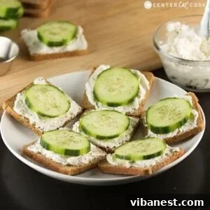 Perfectly presented cucumber sandwiches on a plate