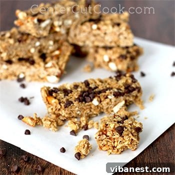 Close-up of freshly cut no-bake peanut butter pretzel chocolate chip granola bars, stacked neatly