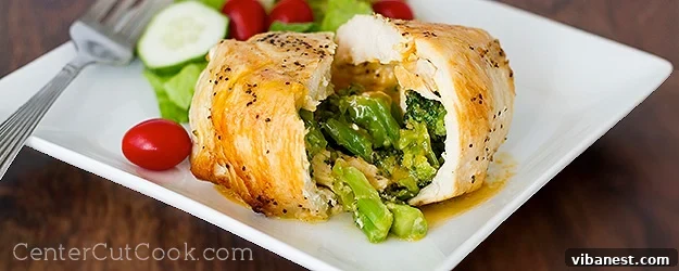 Broccoli and cheddar stuffed chicken, perfectly seared on a skillet, ready to be served