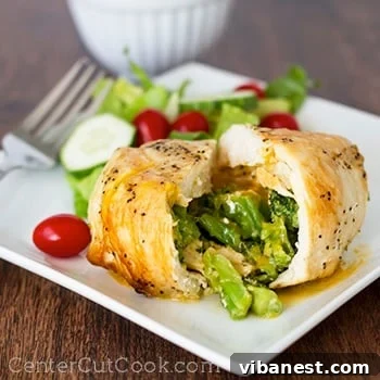Delicious Stovetop Broccoli and Cheddar Stuffed Chicken Stovetop Broccoli and cheddar stuffed chicken served on a plate with a fresh side salad
